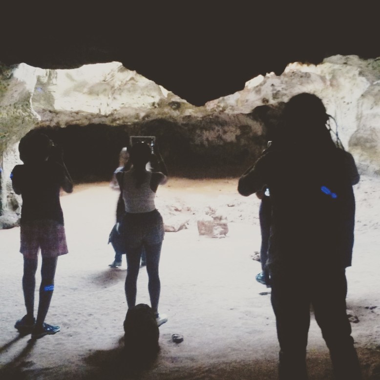 Avantia Damberg, Simone Asia, Ronald Cyrille in Quadirikiri Caves. Photo by Natalie McGuire.